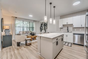 Open kitchen with white island